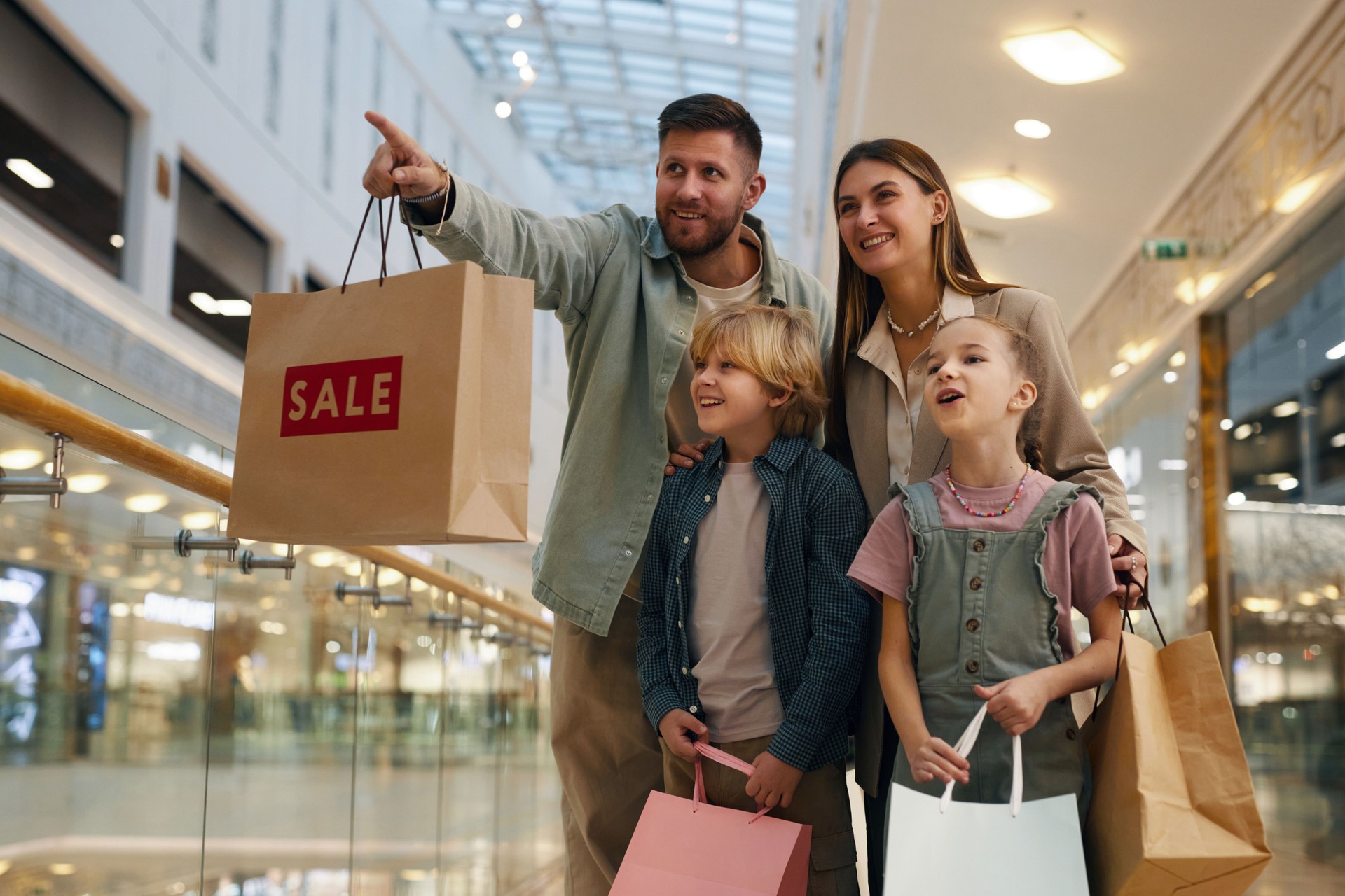 Man Showing New Store in Shopping Mall